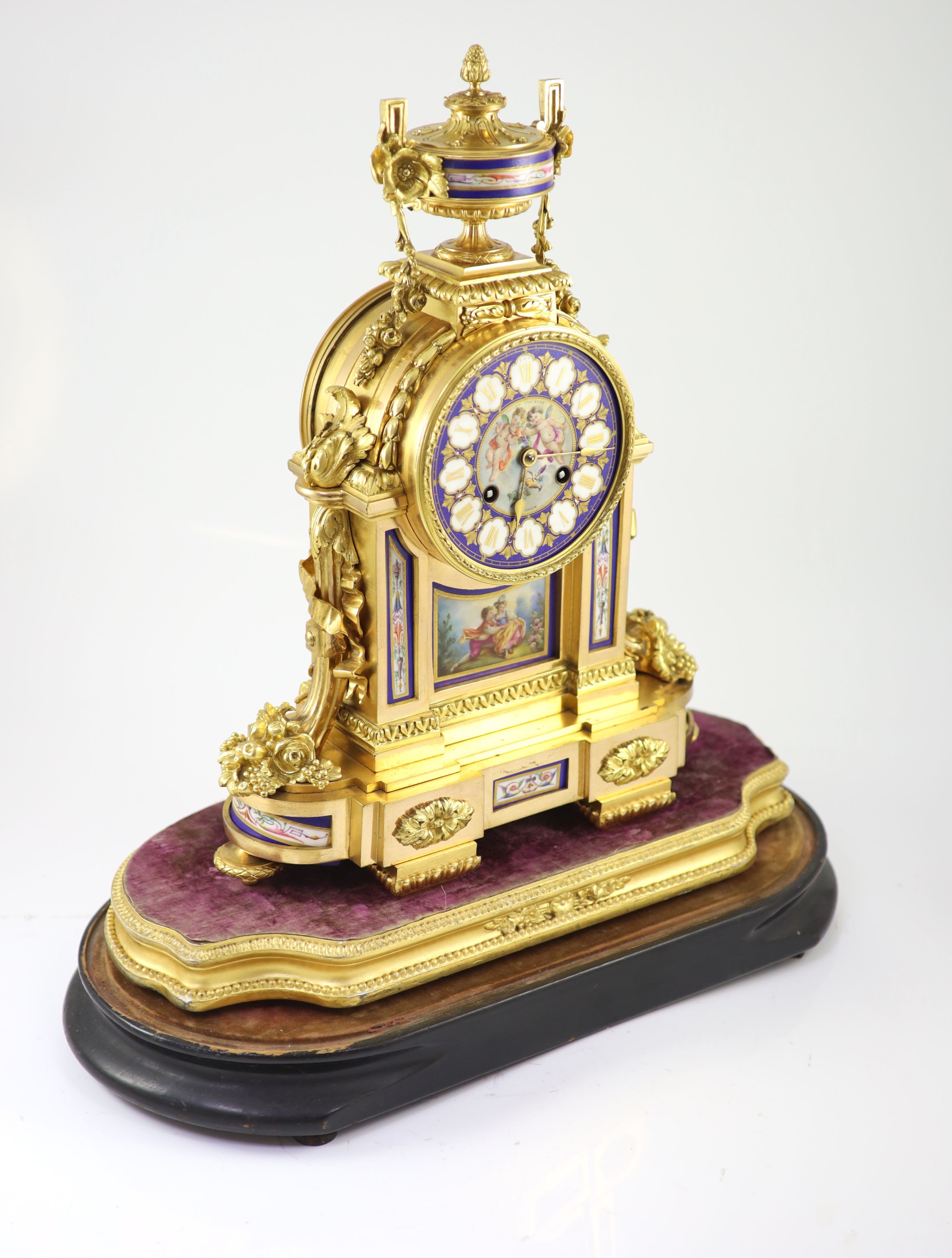 A 19th century French ormolu and Sevres style porcelain mantel clock H 46cm. W 35cm. D 16cm.